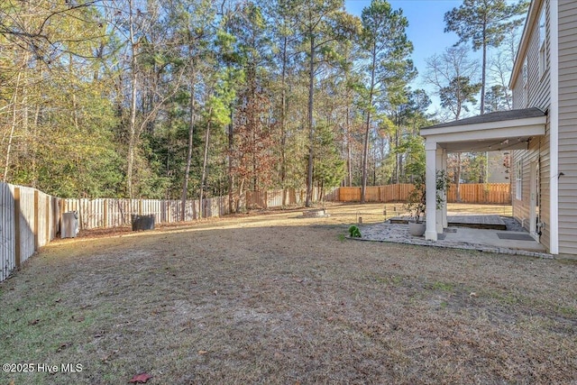 view of yard with a fenced backyard