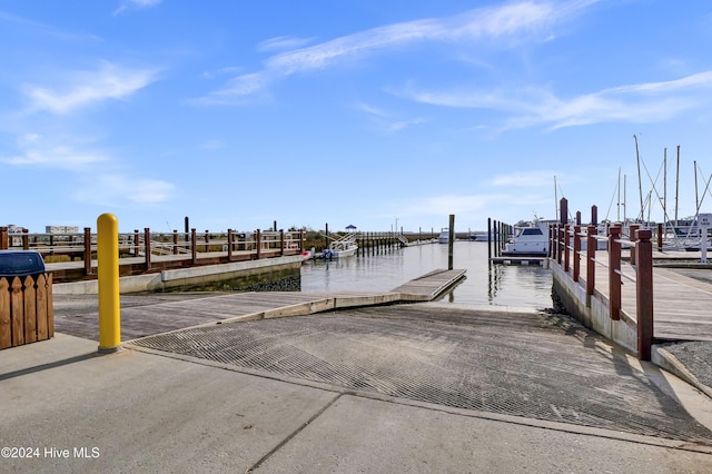 dock area featuring a water view