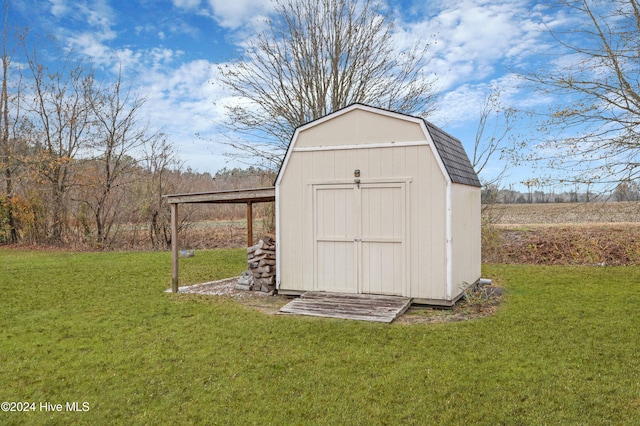 view of outdoor structure with a yard