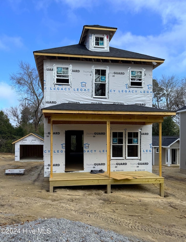 property under construction featuring an outdoor structure