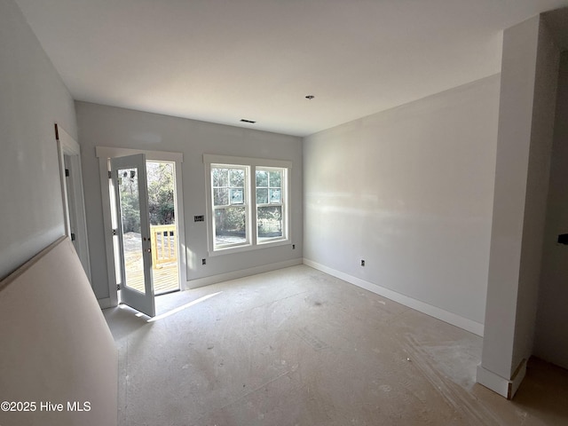 interior space with visible vents and baseboards