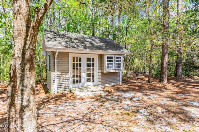3882 White Blossom Cir, Southport, NC 28461 - view of outbuilding with french doors and an outdoor structure