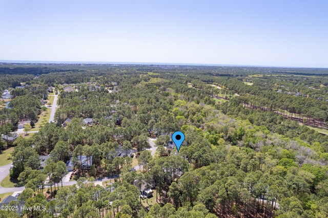 3882 White Blossom Cir, Southport, NC 28461 - aerial view with a wooded view