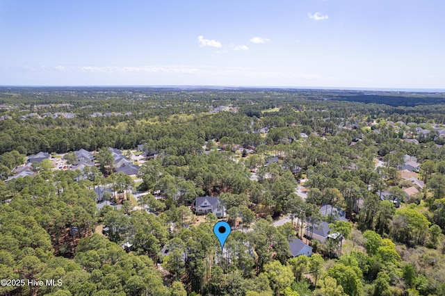 3882 White Blossom Cir, Southport, NC 28461 - birds eye view of property featuring a forest view