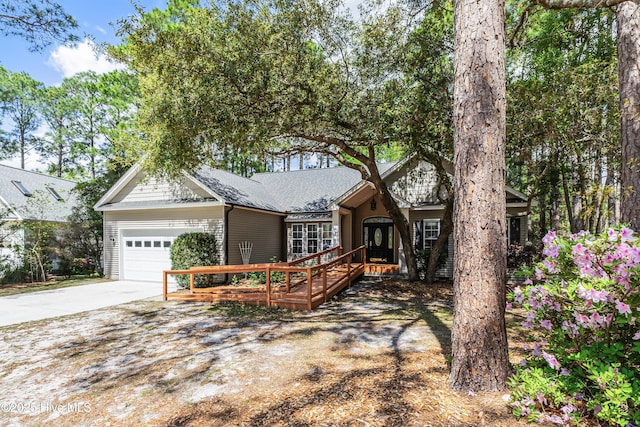 3882 White Blossom Cir, Southport, NC 28461 - single story home with roof with shingles, a garage, and driveway