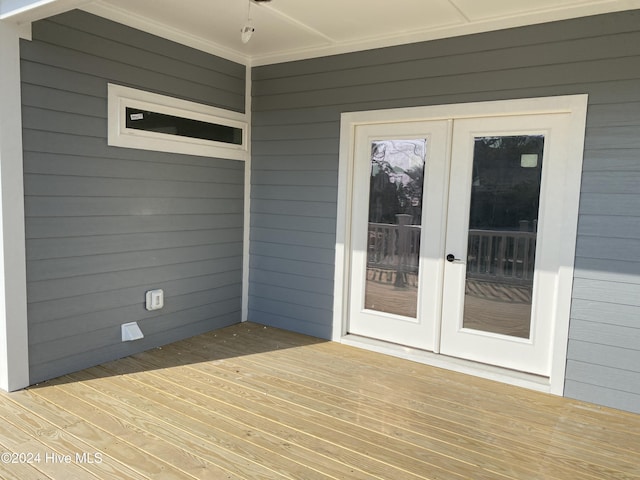 exterior space with ceiling fan and french doors