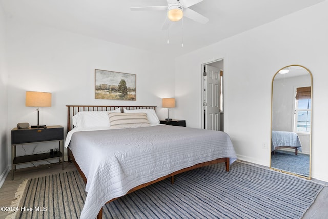 bedroom featuring hardwood / wood-style flooring and ceiling fan