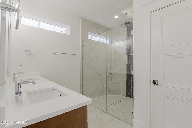 bathroom featuring an enclosed shower