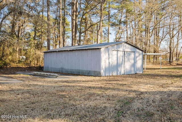 view of outdoor structure with a yard