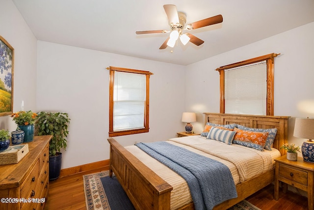 bedroom featuring wood-type flooring and ceiling fan