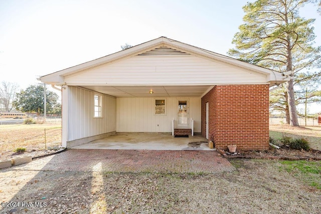 view of front of home with a carport