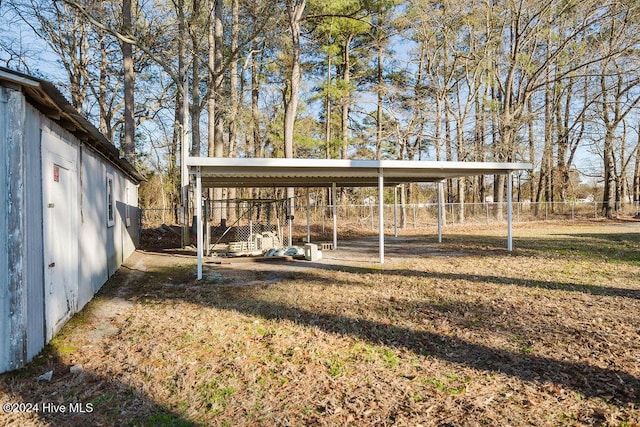 view of yard with a carport