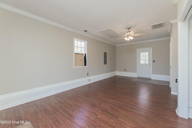 unfurnished room featuring ceiling fan, dark hardwood / wood-style floors, and ornamental molding