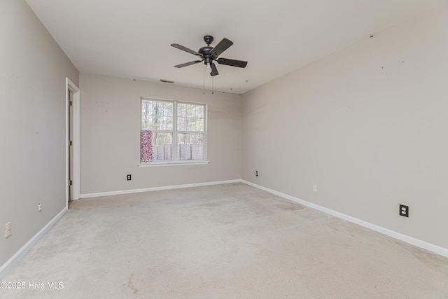 carpeted empty room with ceiling fan