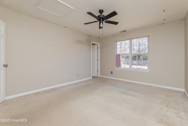 unfurnished room with light carpet and ceiling fan