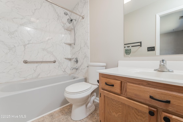 full bathroom with tile patterned floors, vanity, shower / bath combination, and toilet