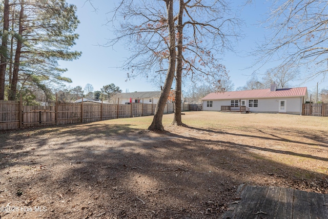 view of yard featuring a wooden deck