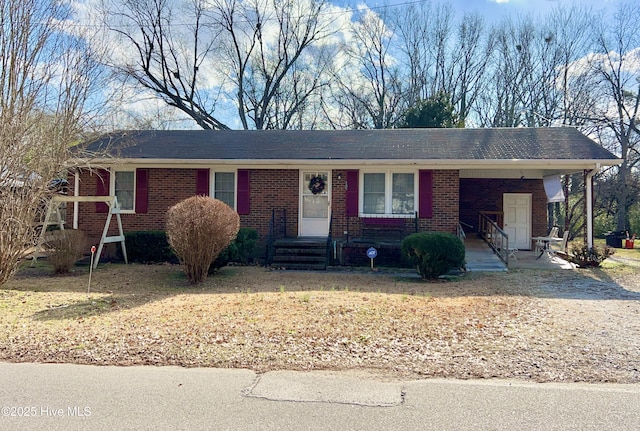 ranch-style home with a front lawn