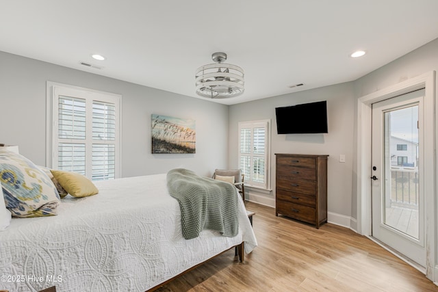 bedroom with recessed lighting, visible vents, light wood-style flooring, and baseboards