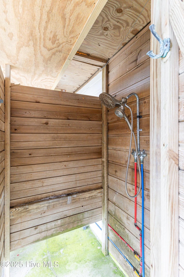 interior details featuring wooden walls