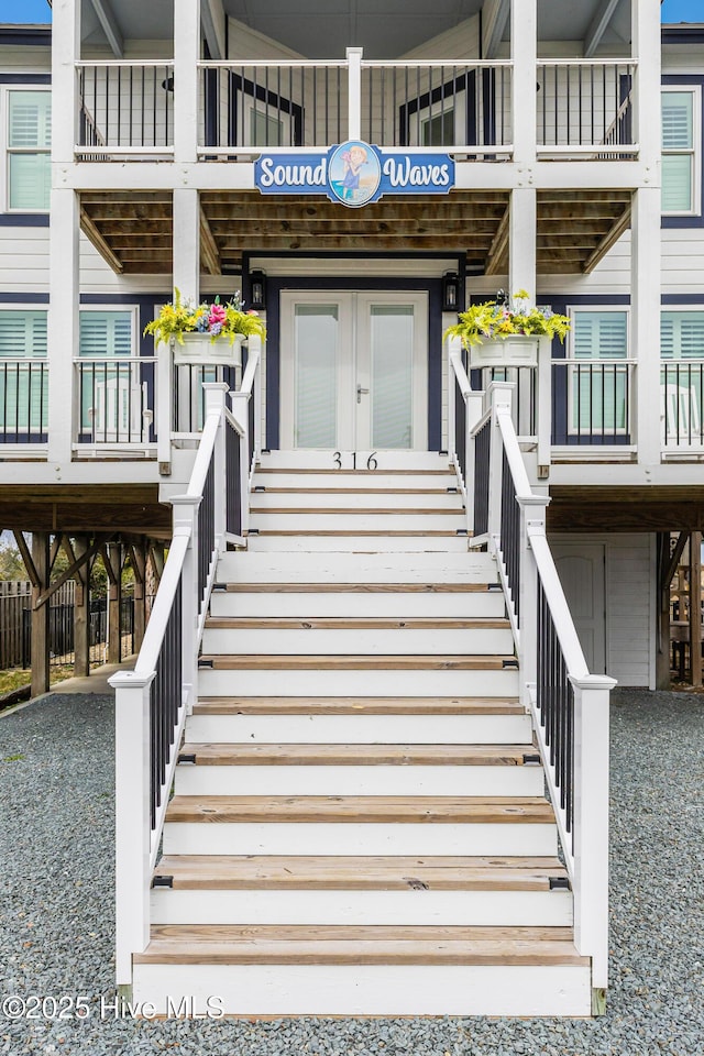 doorway to property featuring french doors