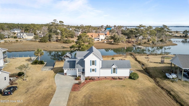 drone / aerial view with a water view