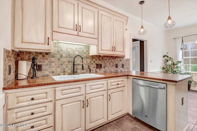 kitchen with sink, stainless steel dishwasher, backsplash, kitchen peninsula, and pendant lighting