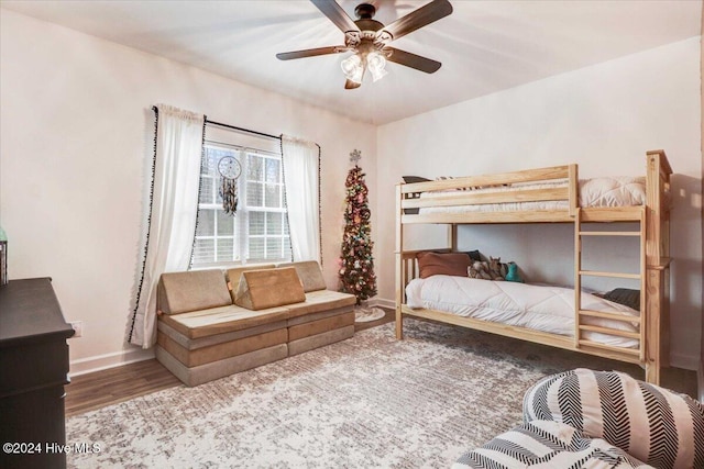 bedroom featuring ceiling fan and hardwood / wood-style flooring