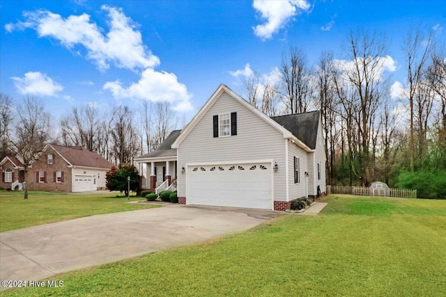 view of front property featuring a front yard and a garage