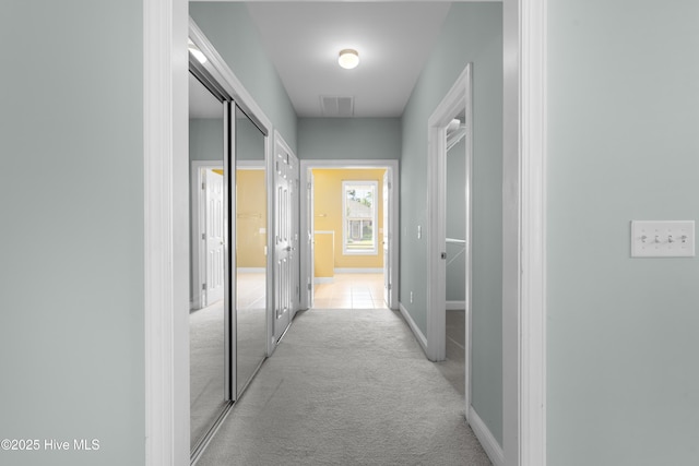 1107 Veranda Ct, Leland, NC 28451 - hallway with light colored carpet and baseboards
