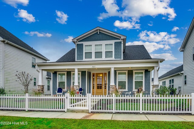 2023 Singing Palm Loop, Little River, SC 29566 - view of front of property with a porch