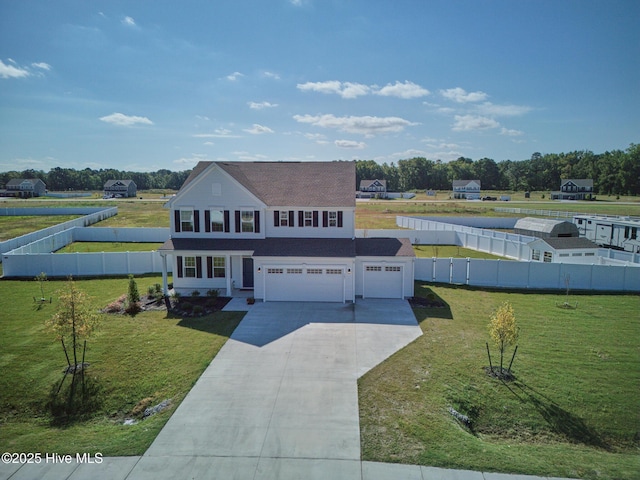 view of front of house with a garage and a front lawn