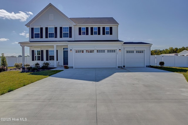 view of front facade with a front yard and a garage