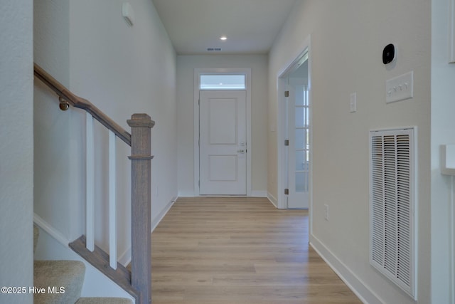 corridor featuring light wood-type flooring