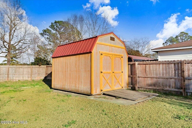 view of outdoor structure with a lawn