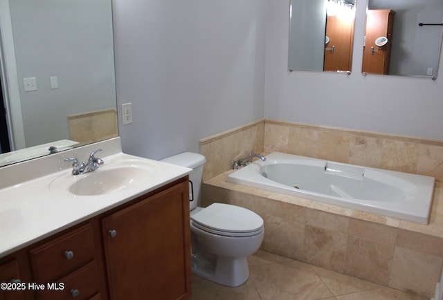 bathroom with tile patterned floors, a relaxing tiled tub, toilet, and vanity