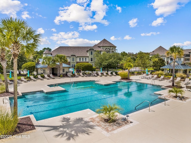 view of pool featuring a patio area