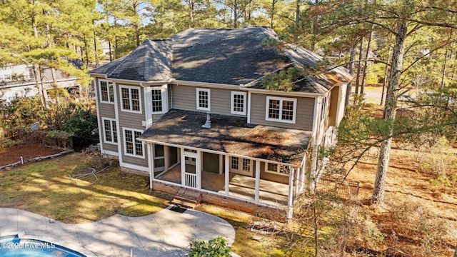 view of front facade with a sunroom