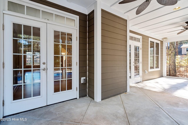 exterior space with ceiling fan, french doors, and a patio