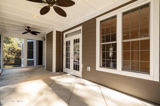 view of patio with french doors and ceiling fan