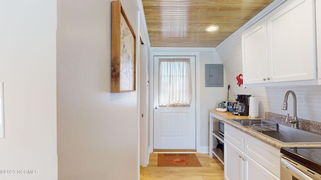 kitchen featuring electric panel, white cabinets, sink, light wood-type flooring, and wood ceiling