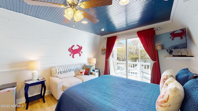 bedroom featuring access to exterior, ceiling fan, crown molding, and hardwood / wood-style flooring