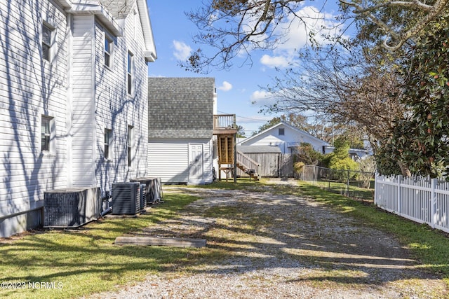 view of yard featuring central AC