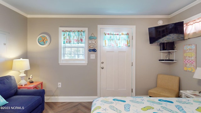 bedroom with parquet floors and ornamental molding