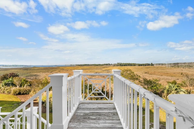 view of home's community featuring a rural view