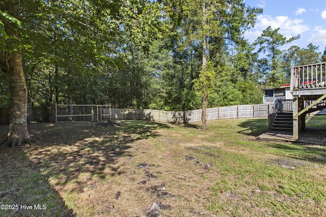 view of yard featuring a deck