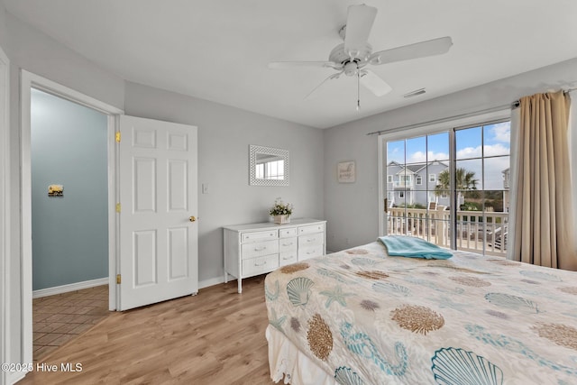 bedroom with access to exterior, ceiling fan, and light wood-type flooring