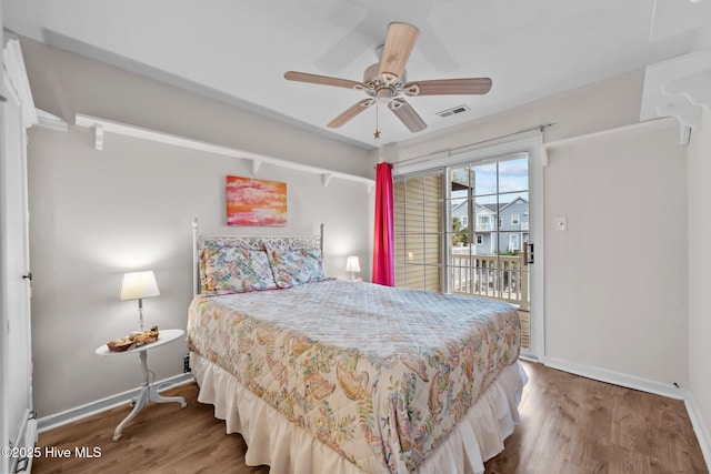 bedroom featuring access to outside, ceiling fan, and hardwood / wood-style flooring