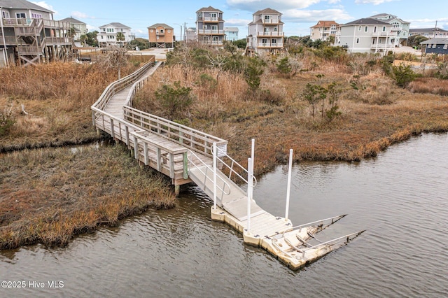 dock area with a water view