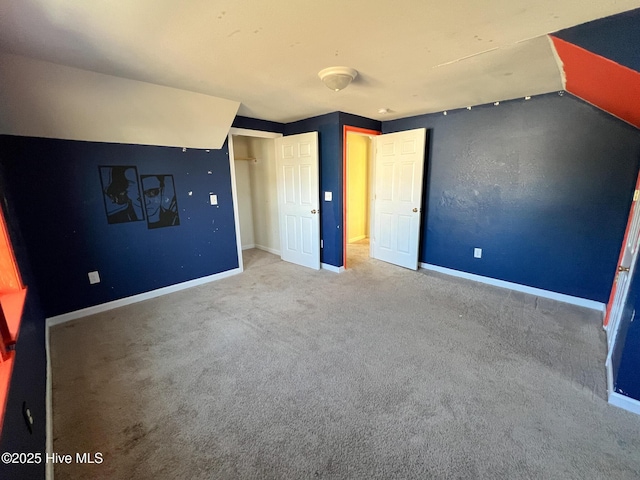 unfurnished bedroom featuring carpet flooring